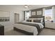 Spacious main bedroom with a king-size bed and plenty of natural light at 12614 Clear Sapphire Dr # 137, Winter Garden, FL 34787