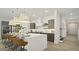 Modern kitchen with large island and dark cabinets at 12614 Clear Sapphire Dr # 137, Winter Garden, FL 34787