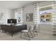 Bright home office features large windows, built-in desk, and ample space at 12614 Clear Sapphire Dr # 137, Winter Garden, FL 34787