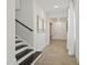 Bright entryway with tile flooring and modern console table at 12614 Clear Sapphire Dr # 137, Winter Garden, FL 34787