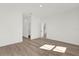 Bright and spacious bedroom with wood-look flooring and ample closet space at 494 Marion Oaks Trl, Ocala, FL 34473