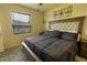 Large bedroom with ample natural light and window coverings at 564 Boardwalk Ave, Haines City, FL 33844