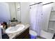 Clean bathroom with shower/tub combo and granite vanity at 564 Boardwalk Ave, Haines City, FL 33844