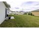 Spacious backyard with grassy lawn at 564 Boardwalk Ave, Haines City, FL 33844