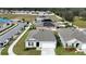 Aerial view of house and neighborhood at 564 Boardwalk Ave, Haines City, FL 33844