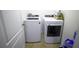 Bright laundry room with washer and dryer at 564 Boardwalk Ave, Haines City, FL 33844