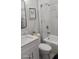 Clean bathroom with a white vanity, marble shower, and a bathtub at 6748 Cherry Rd, Ocala, FL 34472
