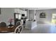 Open concept kitchen with stainless steel appliances and an island at 6748 Cherry Rd, Ocala, FL 34472