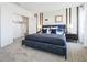 Main bedroom with walk-in closet and plush carpeting at 2721 Golden Trout Ln, Edgewater, FL 32141