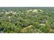 Wide aerial view of the neighborhood, showing surrounding houses and golf course at 358 Winchester Ct, Longwood, FL 32779