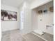 Open laundry room with shelving and built-in folding counter at 2719 Golden Trout Ln, Edgewater, FL 32141