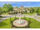 Community center with fountain and lush landscaping at 185 Villa Di Este Ter # 201, Lake Mary, FL 32746