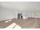 Spacious living area with hardwood floors and an open floor plan at 494 Marion Oaks Trl, Ocala, FL 34473