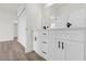 Bathroom with white cabinets and a modern vanity at 494 Marion Oaks Trl, Ocala, FL 34473