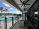 Outdoor patio with seating and pool view at 331 Muirfield Loop, Reunion, FL 34747