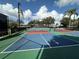 Two well-maintained pickleball courts with green and blue surfaces at 331 Muirfield Loop, Reunion, FL 34747