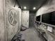 Superhero themed game room with two large TVs and comfortable seating at 331 Muirfield Loop, Reunion, FL 34747