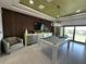 Modern game room with pool table and view at 331 Muirfield Loop, Reunion, FL 34747