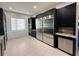 Spacious kitchen with stainless steel appliances and granite countertops at 331 Muirfield Loop, Reunion, FL 34747