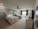 Main bedroom with two queen beds and view at 331 Muirfield Loop, Reunion, FL 34747