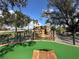 Enjoyable mini golf course with a waterfall feature at 331 Muirfield Loop, Reunion, FL 34747