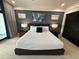 Serene bedroom with a king-size bed and elegant decor at 331 Muirfield Loop, Reunion, FL 34747