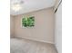 Well-lit bedroom with ceiling fan and neutral walls at 180 N Lakewood Cir, Maitland, FL 32751