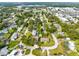 Wide aerial showcasing the neighborhood and nearby amenities at 180 N Lakewood Cir, Maitland, FL 32751