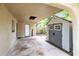 Covered patio with storage shed in backyard at 180 N Lakewood Cir, Maitland, FL 32751