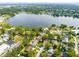 Aerial view of homes near a lake at 180 N Lakewood Cir, Maitland, FL 32751