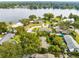 Aerial view of waterfront community with lush landscaping at 180 N Lakewood Cir, Maitland, FL 32751