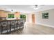 Eat-in kitchen with breakfast bar and light wood cabinets at 180 N Lakewood Cir, Maitland, FL 32751