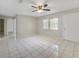 Bright living room featuring tile floors and ceiling fan at 793 E Birchwood Cir, Kissimmee, FL 34743