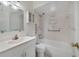 Clean bathroom with shower/tub combo and white vanity at 793 E Birchwood Cir, Kissimmee, FL 34743