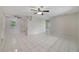 Spacious living room with tile flooring and ceiling fan at 793 E Birchwood Cir, Kissimmee, FL 34743
