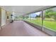 Spacious screened porch overlooking a tranquil pond at 793 E Birchwood Cir, Kissimmee, FL 34743