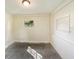 Empty spare bedroom with new carpet and fresh paint at 303 Carleton St, Lakeland, FL 33803