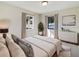 Main bedroom with ample natural light and a dresser at 303 Carleton St, Lakeland, FL 33803