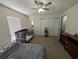 Spacious bedroom with a crib and double bed at 1301 Redwood Ct, Tavares, FL 32778