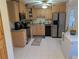 View of a well-maintained kitchen, offering functionality and style at 1301 Redwood Ct, Tavares, FL 32778