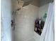 Large walk-in shower with modern fixtures and tile at 1315 Pine Island N Dr, Saint Cloud, FL 34771