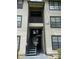 Apartment building entrance with stairs at 4647 Cason Cove Dr # 2425, Orlando, FL 32811