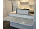 Kitchen with white cabinets and countertops at 4647 Cason Cove Dr # 2425, Orlando, FL 32811
