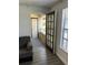 View of living room with access to balcony at 4647 Cason Cove Dr # 2425, Orlando, FL 32811