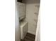 Stackable washer and dryer in a closet with wire shelving at 4647 Cason Cove Dr # 2425, Orlando, FL 32811