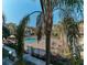 Community pool with surrounding patio and lounge chairs at 912 Charo Pkwy # 223, Davenport, FL 33897