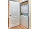 Stackable washer and dryer in a convenient laundry closet at 912 Charo Pkwy # 223, Davenport, FL 33897