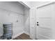 Laundry room with shelving and vinyl flooring at 405 N Mcdonald Ave, Deland, FL 32724