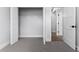 Bedroom with double door closet and hardwood floors at 405 N Mcdonald Ave, Deland, FL 32724