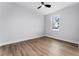 Bedroom with hardwood floors and a window at 405 N Mcdonald Ave, Deland, FL 32724